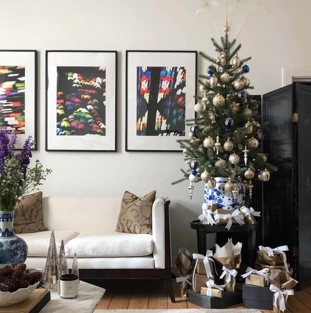 christmas decorations and small tree in living room