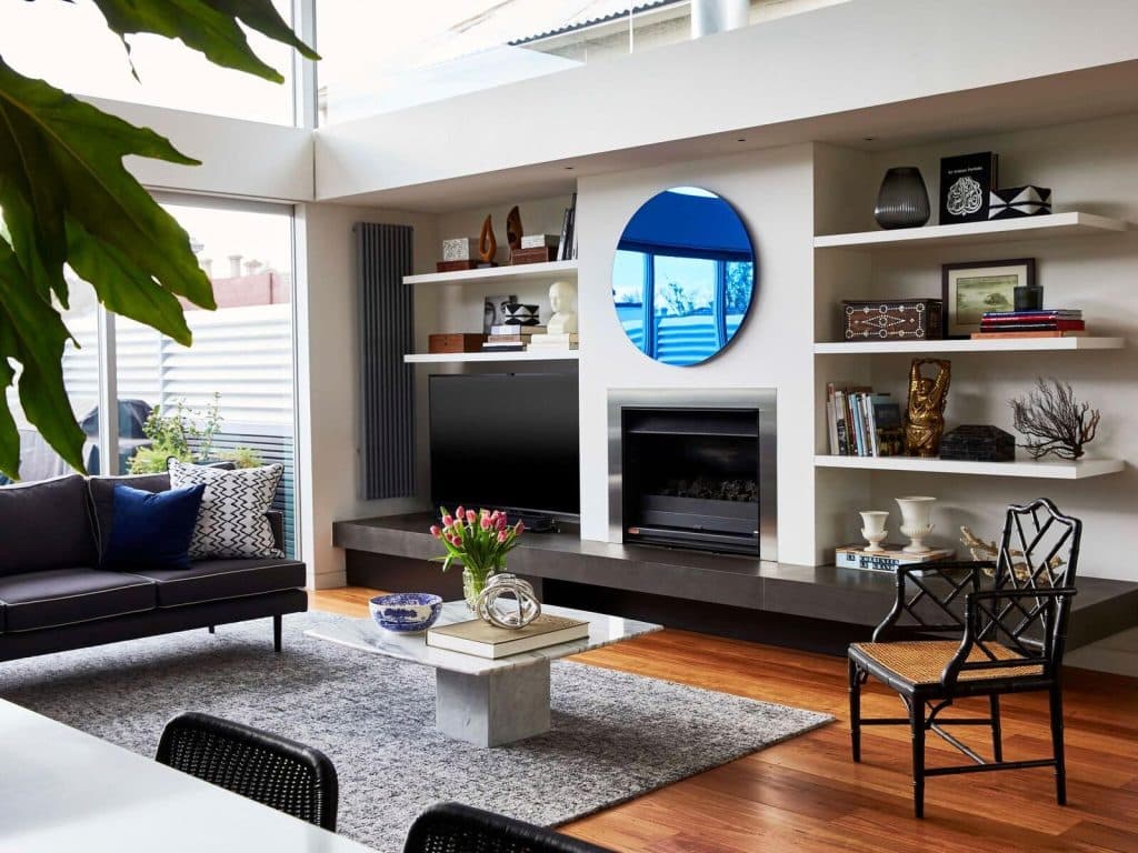 lounge area of home. Tv and fireplace. Decor.